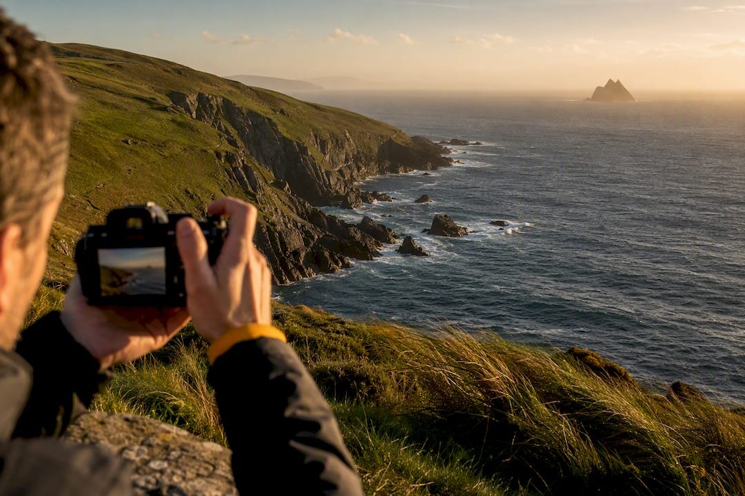 Camera framing Kerry cliffs at golden hour